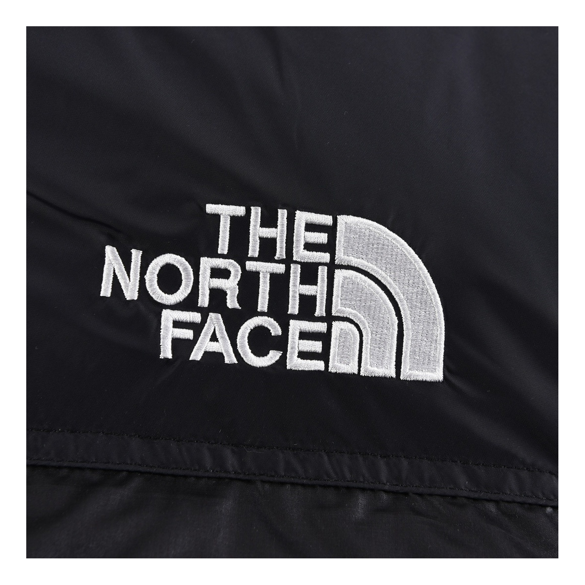 The North Face Contrast-Panel Stand-Collar Puffer Jacket | Bold Two-Tone Winter Style
