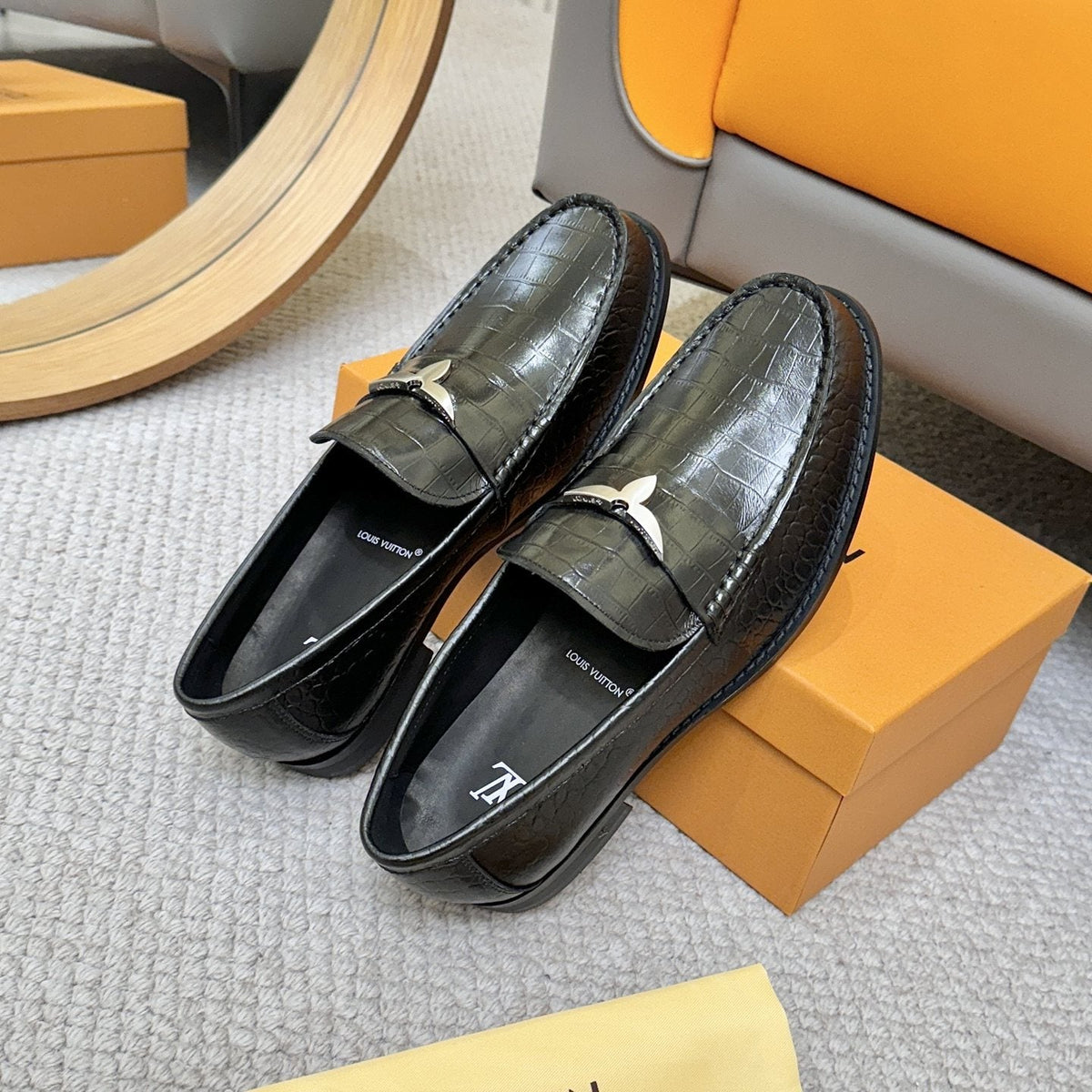 Louis Vuitton Men's Black Embossed Leather Loafers