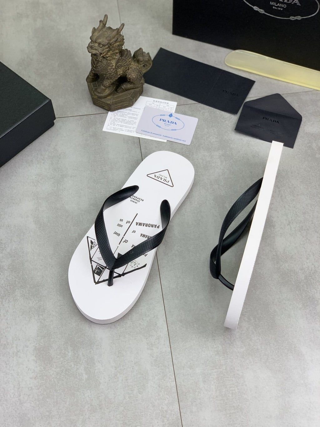Prada Black Strap White Flip Flops