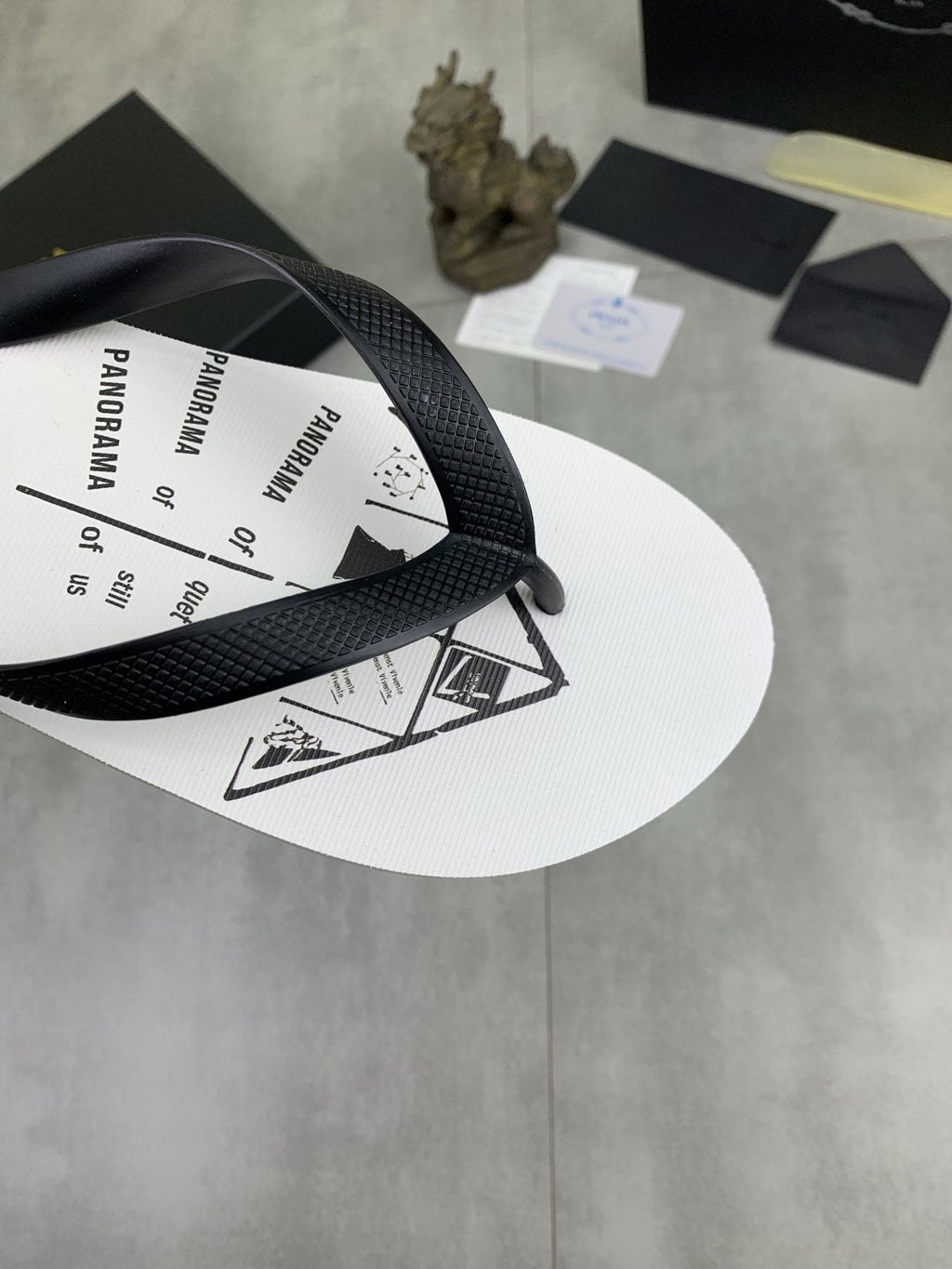 Prada Black Strap White Flip Flops