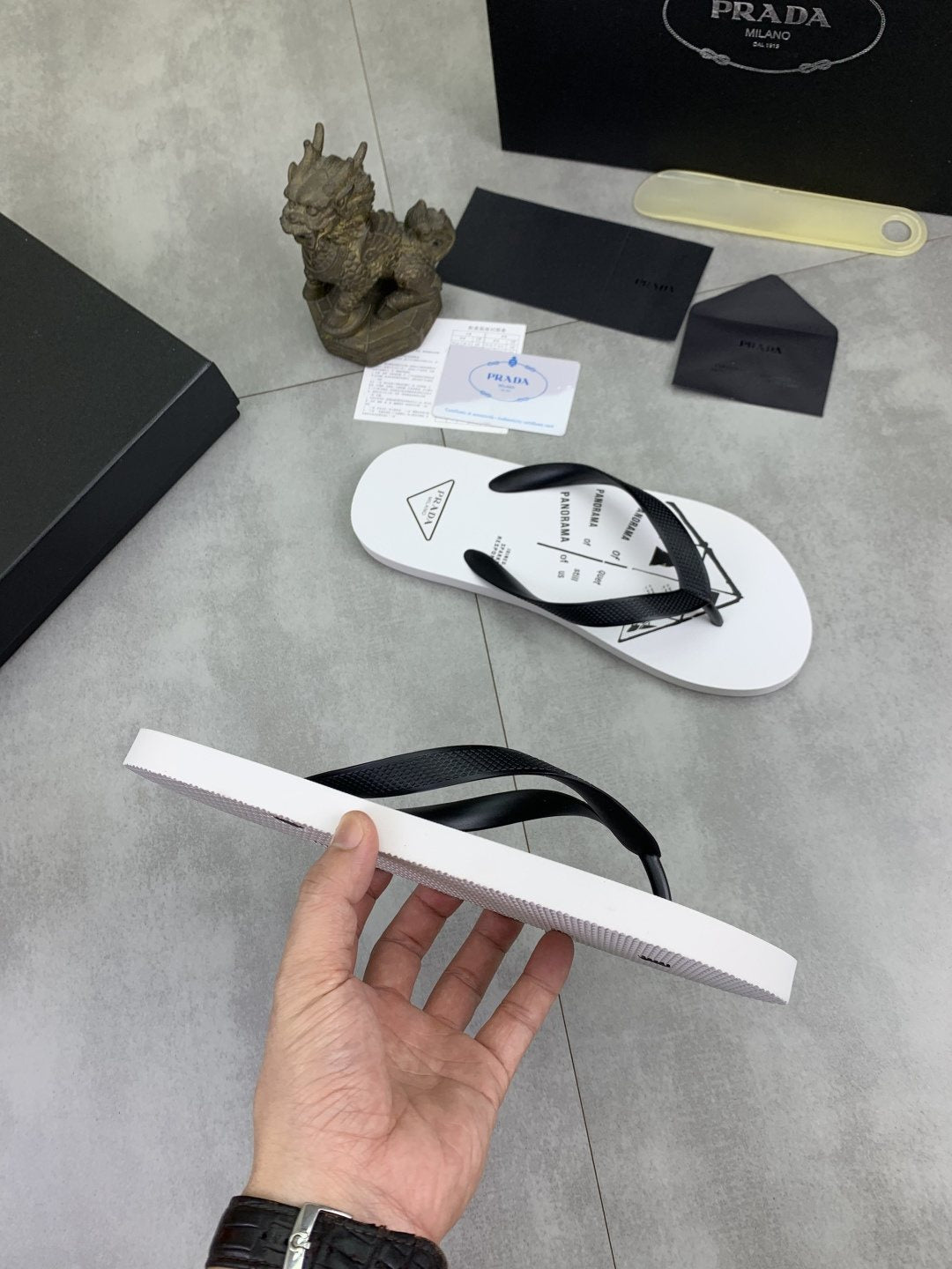 Prada Black Strap White Flip Flops
